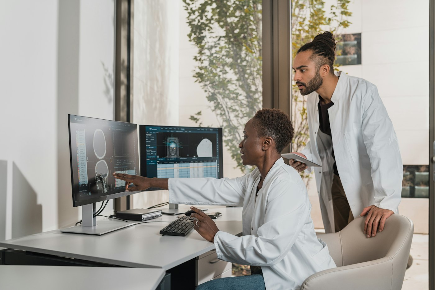 Radiologists working at imaging workstations